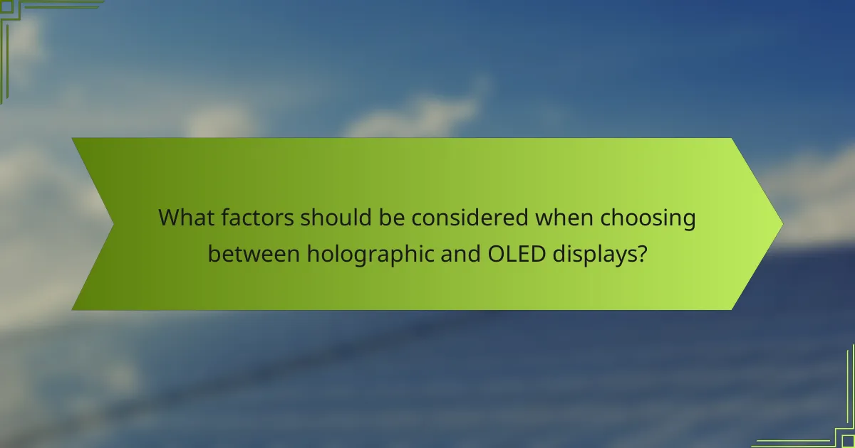 What factors should be considered when choosing between holographic and OLED displays?